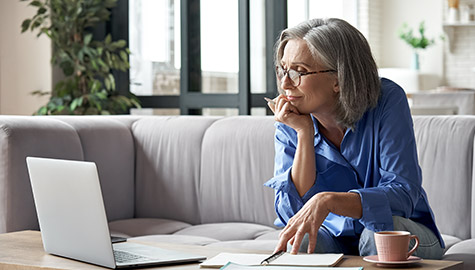 watching business training, online webinar on laptop computer