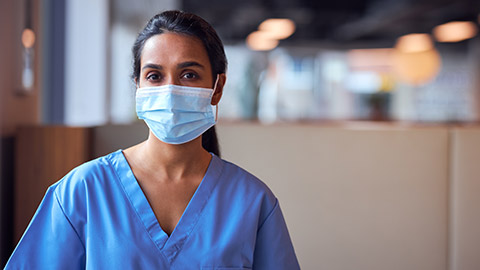 A carer wearing PPE