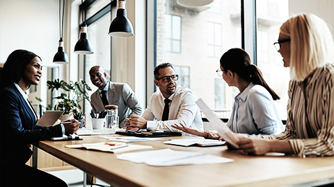 A group of people discussing policies