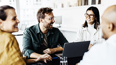 professionals sitting around a table and having a discussion