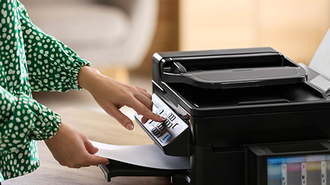 A person using a printer