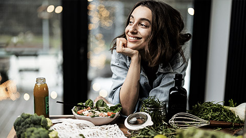 A person preparing a healthy meal