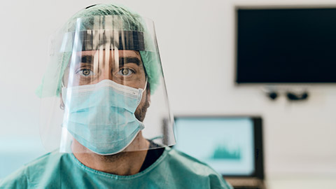 A close view of a person wearing PPE