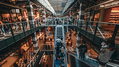 The interior of a busy shopping mall