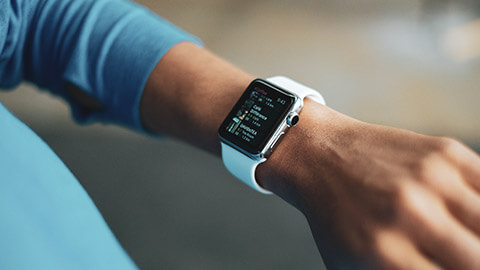 A close view of a smart watch on a person's arm