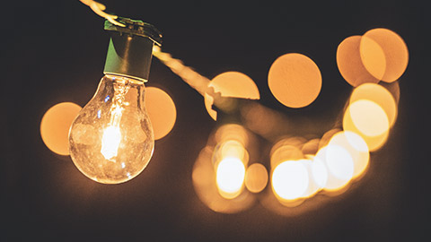 A close view of a string of light bulbs