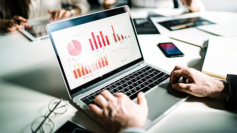 An business owner looking at their organisation's allocation of finances across different initiatives