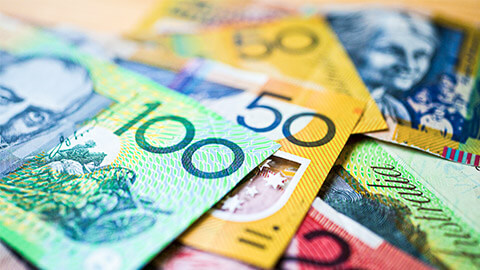 A close up of Australian currency in different denominations