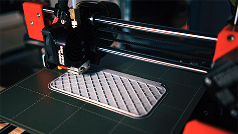 A 3D printer producing an object, using extrusion