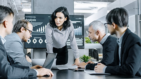 woman leading a team meeting