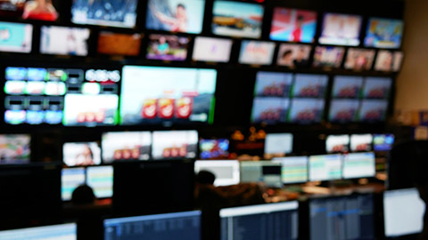 A TV control room with multiple monitors