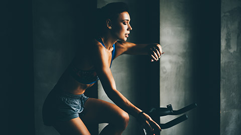 A person riding a stationary bike