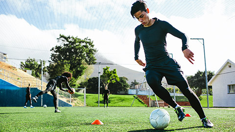 A teenager at soccer practice