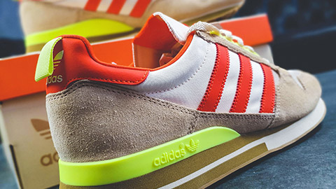 A close view of a pair of classic Adidas shoes