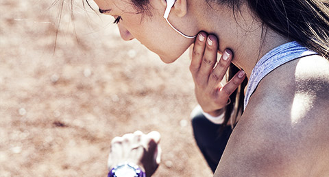 A person checking their pulse