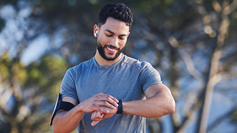 Runner with fitness smart watch