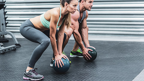 MAle and female working out together