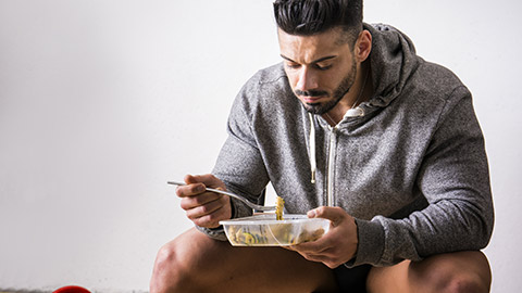 A person eating before going to the gym