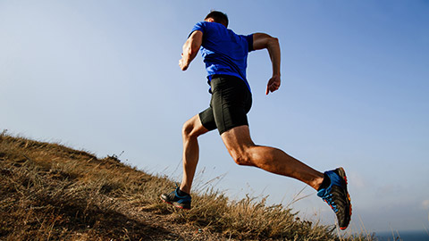 A person running up a hill