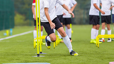 A soccer player doing agility drills