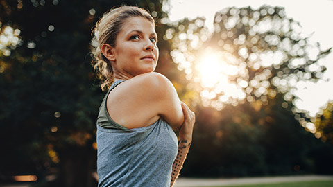 A person doing a morning workout outdoors