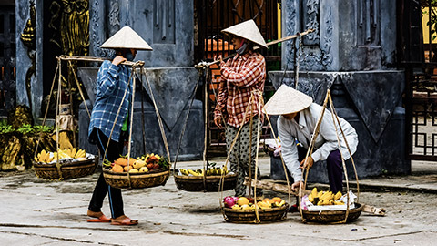 Vietnamese carrying food