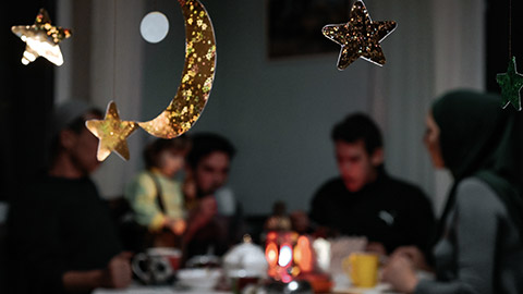 Muslim family eating meal on special occassion