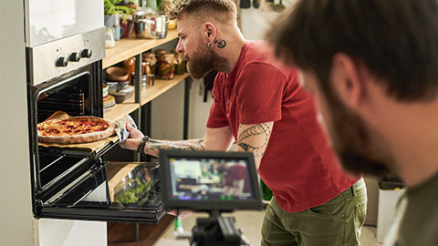 Men Filming Cooking Show At Kitchen