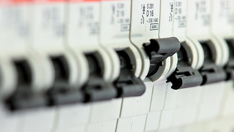 A close view of a circuit breaker board