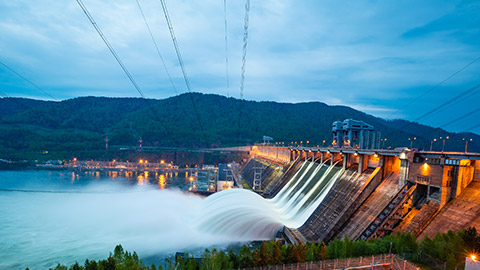 A hydro-electric plant at sunset