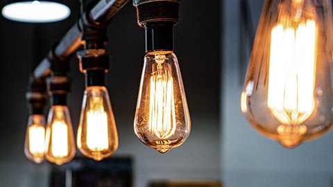 A close view of a string of lightbulbs