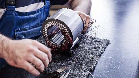 A person fixing an armature