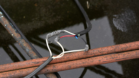 interconnected wires insulated with electrical tape