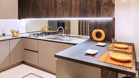 Inerior of modern kitchen with accent lighting