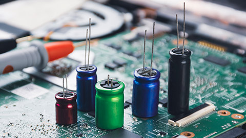 A group of capacitors on a circuit board