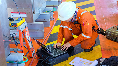 A technician checking a work site