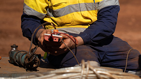 A person testing a piece of equipment