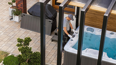 Professional Caucasian Garden SPA Technician Finishing Hot Tub Installation