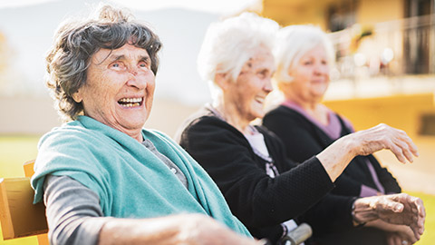 A group of aged care clients outdoors