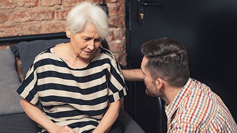 depressed elderly caucasian grandmother suffering from dementia