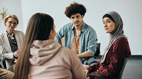 A diverse work group talking