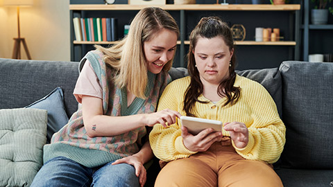 A disability support worker with a client