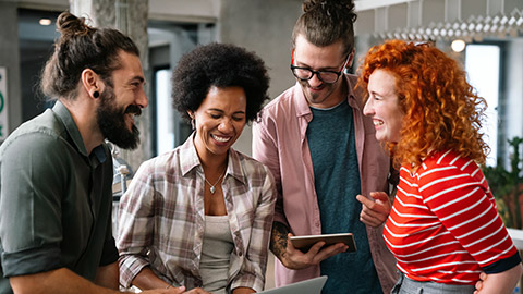 A diverse work team sharing a laugh