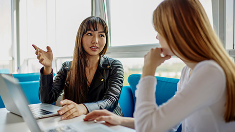 colleagues discussing verbally