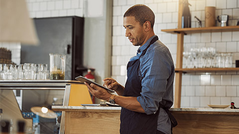 Businessman, barista and digital with tablet for cafe