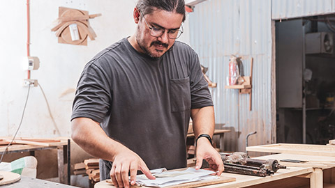 A carpenter working in a shop