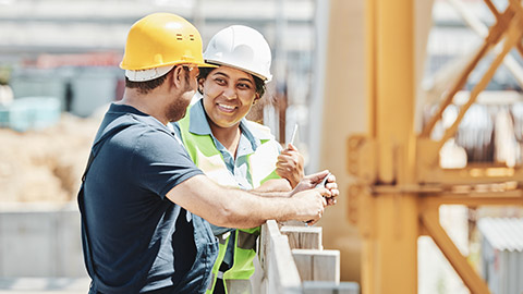 A supervisor talking to a colleague