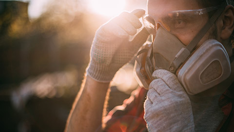 A close view of a person wearing PPE