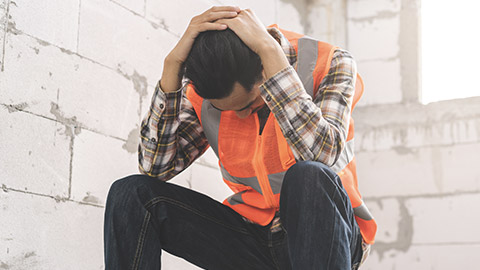 An unhappy worker on a job site