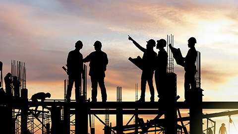 Engineers and workers at the construction site